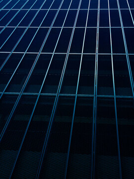 Glass building pattern. Exterior view of modern glass structure with geometric design