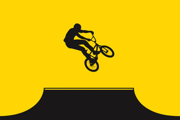 Obraz premium BMX rider jumping on yellow background black silhouette cyclist bicycle bike sports