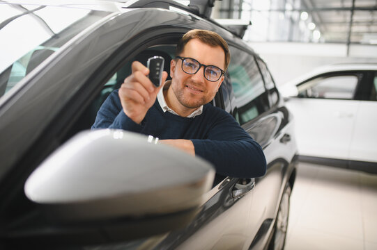 New car, dealership and portrait of happy man in vehicle for purchase, good service or loan success