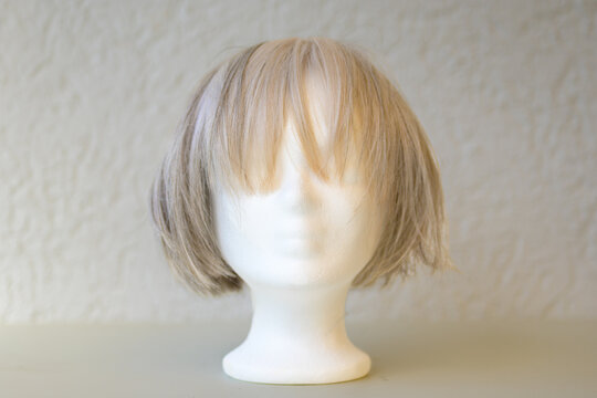 Blonde Wig Displayed On Mannequin