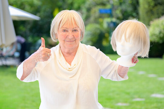 Senior Woman Showing Wig Approval