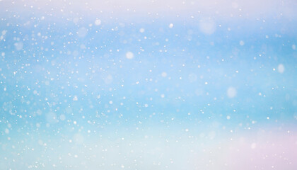 Fototapeta premium Beautiful soft blue and pink pastel background with magical falling snow or bokeh particles