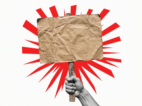 Protest sign held by hand