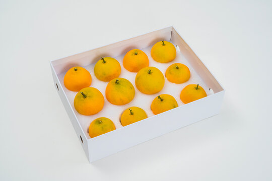 Fresh oranges on a white background