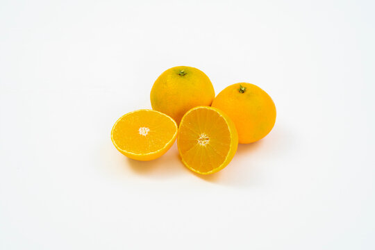 Fresh oranges on a white background