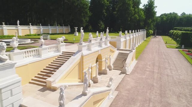 Smooth forward drone flight along palace sculpture rows
