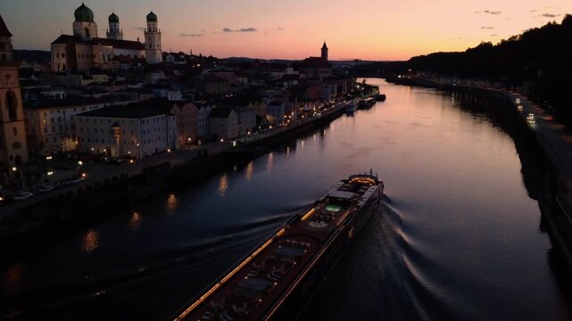 Aerial view of a river cruise ship in Passau at dusk