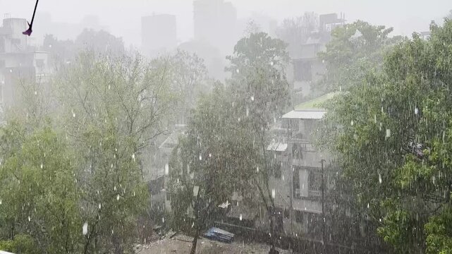 A  sudden change in weather brings hailstorm in the city