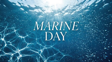 Marine Day text on beautiful underwater background with sunlight caustics shining through deep blue sea water surface