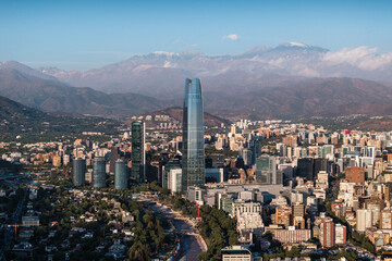 Fototapeta premium Aerial view of the Santiago skyline and Andean mountain scenery