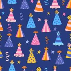 Fototapeta premium Birthday Party Hats Seamless Pattern with Stars and Streamers on Dark Blue