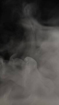 Seamlessly looping thick billowing smoke drifting across the frame, alpha channel for transparent background, optimized for mobile devices, vertical orientation, seamless loop, 30p