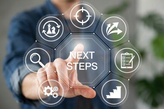 Business professional touching a digital interface with next steps icons