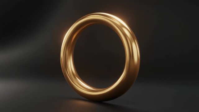 Golden Ring rotating slowly with dramatic studio lighting and shallow depth of field for luxury concepts