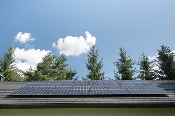 Fototapeta premium Photovoltaic panels on the house roof. Electricity generation. 
