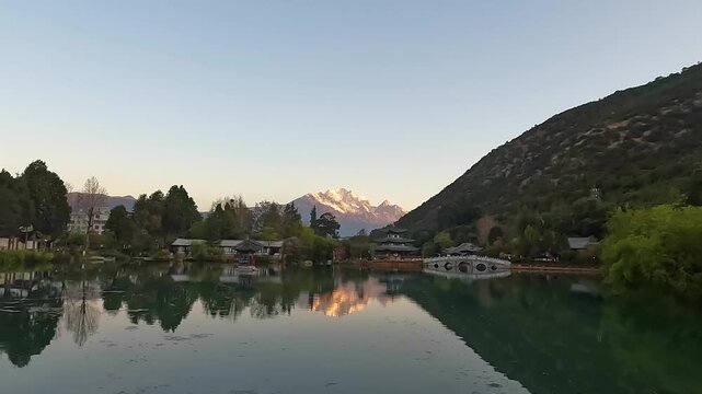 Landscape Black Dragon Pool is a famous pond in the scenic Jade Spring Park (Yu Quan Gong Yuan) located at the foot of Elephant Hill, a short walk north of the Old Town of Lijiang in Yunnan province, 