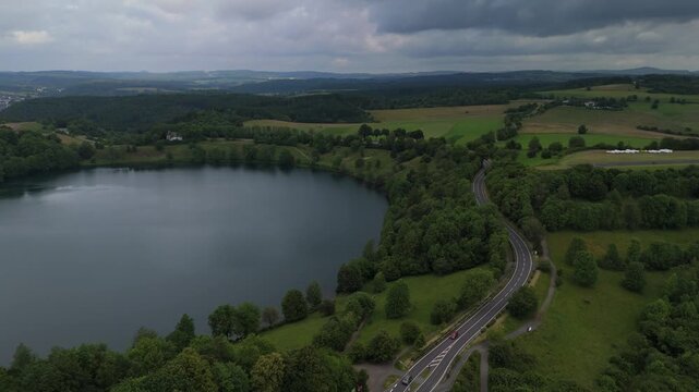 High Angle Flight Over Isolated Volcanic Maar Lake
