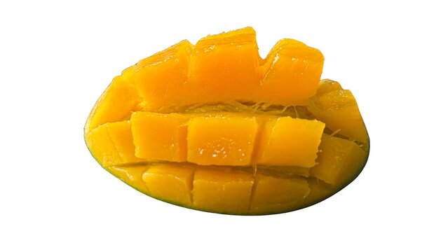 Delicious mango half expertly diced into perfect cubes on white background