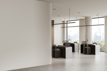 Fototapeta na wymiar Modern spacious office interior featuring a large empty wall and sleek contemporary workstations in bright natural light with panoramic cityscape views. 3D Rendering
