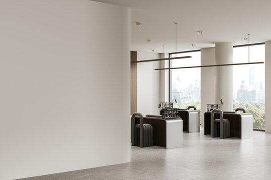 Modern spacious office interior featuring a large empty wall and sleek contemporary workstations in bright natural light with panoramic cityscape views. 3D Rendering