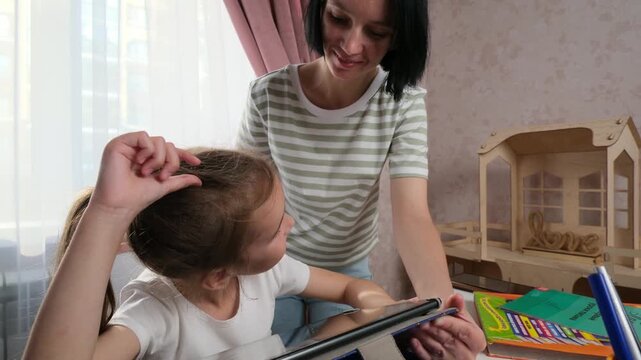 Mother helping child with emotional learning and emotional intelligence development