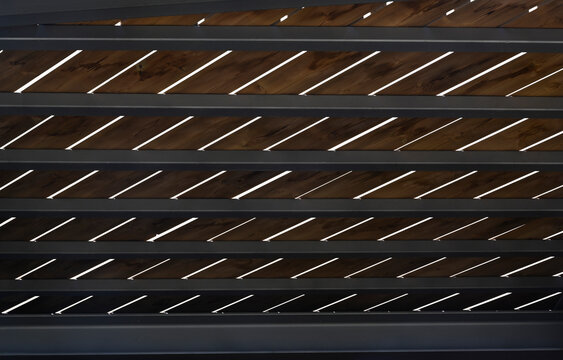 Wooden terrace with steel metal construction texture background.