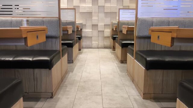 Modern cafe interior with cozy booth seating