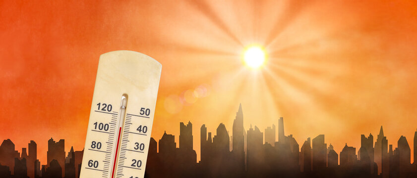 Extreme Heat Wave Over City Skyline with Thermometer and Blazing Sun