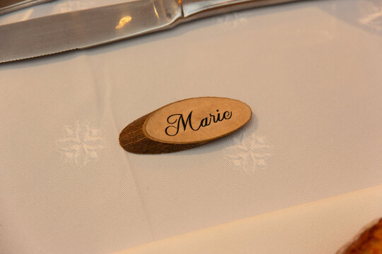 A place setting with a personalized name tag for Mario