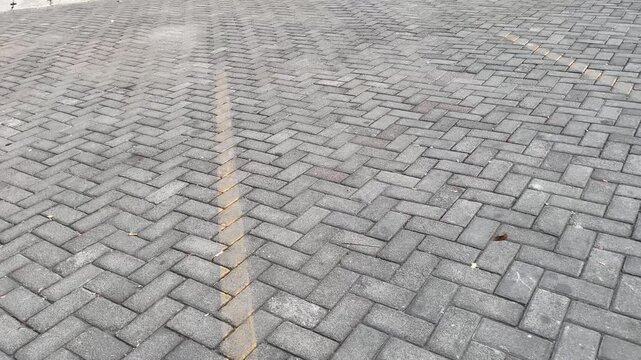 Paving block road surface texture for urban infrastructure concept