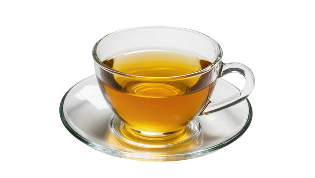 Isolated clear glass cup with hot golden tea on a matching transparent saucer ready for a refreshing drink.