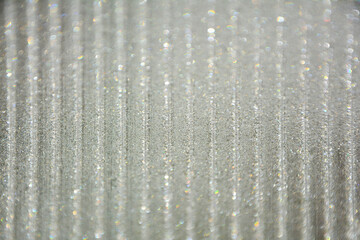 Krople rosy na poliwęglanie komorowym, dew drops on cellular polycarbonate, Striped carbonate with drops of dew on a sunny day. transparent roof. Bottom view. © kateej
