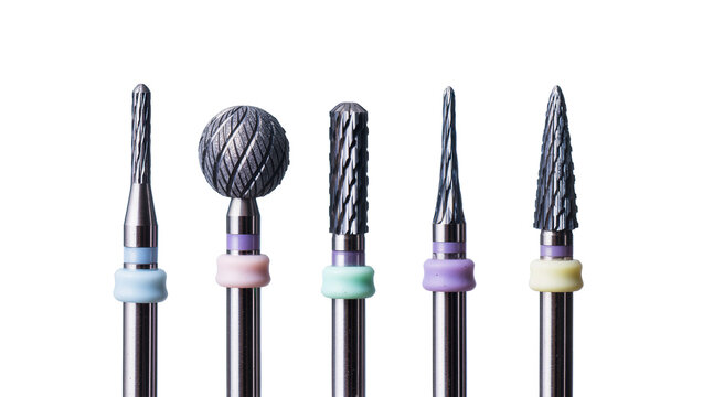 Isolated professional set of five dental burs and drills for precise dentistry work