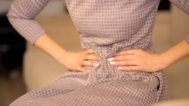 Patient Holding Belly Suffering From Menstrual Pain. Period Cramps