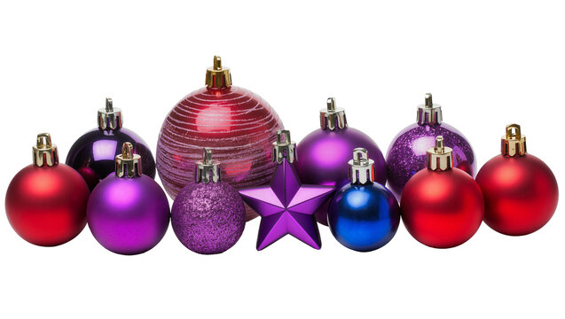 Isolated bright Christmas ornaments, red, purple, and blue baubles, and a shiny star decoration