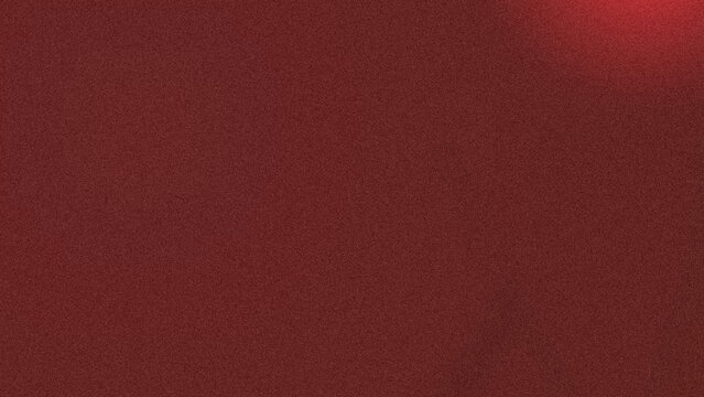 Solid dark red background with a soft light glow in the corner