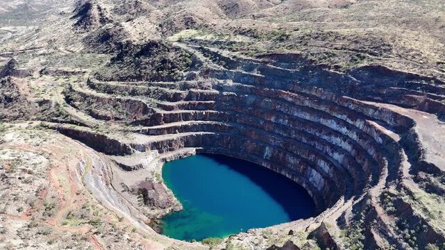 Aerial View of the Abandoned Mary Kathleen Uranium Mine Open Pit with Vibrant Blue Water, Outback Queensland Australia