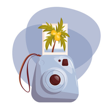 Blue Instax with a photo of palm trees and lemon