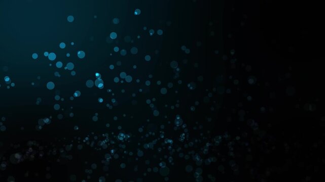 Blue particle motion graphics background with a seamless circular bokeh loop.