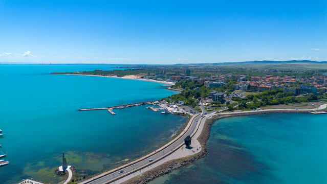 Aerial view of the historic isthmus road with the famous wooden windmill at the entrance of UNESCO Nesebar Old Town in Bulgaria