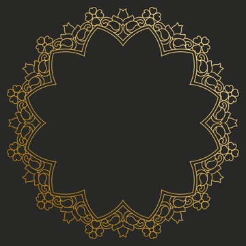 Circular photo frame with a gold rim and decorative leaf and floral patterns.