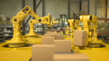 Fototapeta premium Yellow robotic arms handling cardboard boxes on a conveyor line inside a warehouse with blurred industrial background and warm lighting.