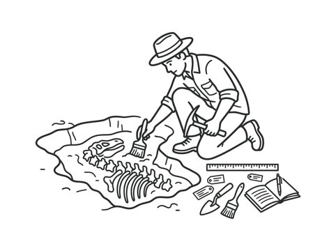 Man crouches beside fossil excavation site with tools and book nearby outdoors