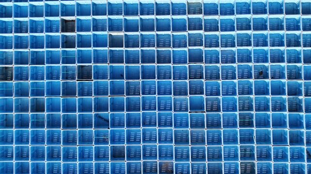 Blue plastic industrial recycling baskets crates pattern