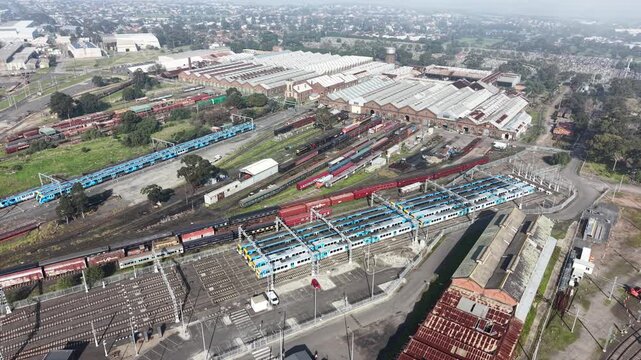 Aerial view of a large train depot and railway yard