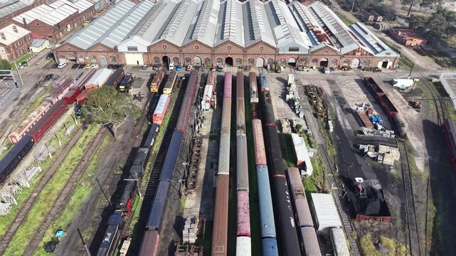 Aerial view of old train depot with multiple railway tracks