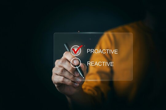 Business person choosing between proactive and reactive approach on a digital glass screen