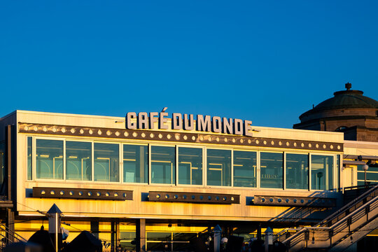 Quebec City, Quebec, Canada, July 12, 2026 - The Caf&eacute; du Monde sign on its 2002 building at the Cruise Terminal Pier 22 seen during a golden hour summer hour