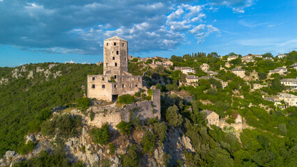 Naklejka premium Aerial View of Historic Pocitelj Citadel and Stone Tower in Bosnia and Herzegovina