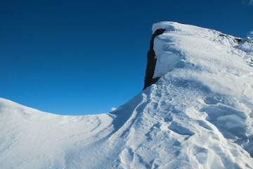 Snowy mountain ridge.  Orobie Alps, Italy. © Gherzak